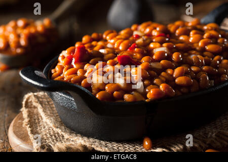 Homemade Barbecue Baked Beans in a Black Skillet Stock Photo