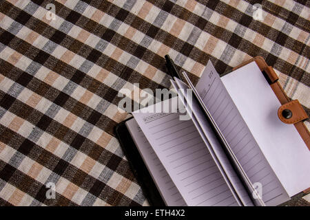 Notebook cotton texture background recording function. Stock Photo