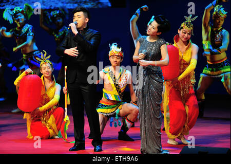 Xiamen, China's Fujian Province. 14th June, 2015. Singers perform before the opening of the 7th Straits Forum in Xiamen, southeast China's Fujian Province, June 14, 2015. The 7th Straits Forum opened here on Sunday. © Wei Peiquan/Xinhua/Alamy Live News Stock Photo