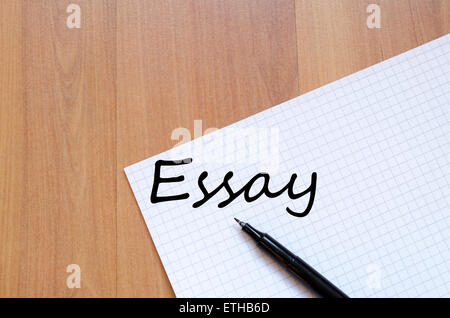 White blank notepad on office wooden table Essay concept Stock Photo