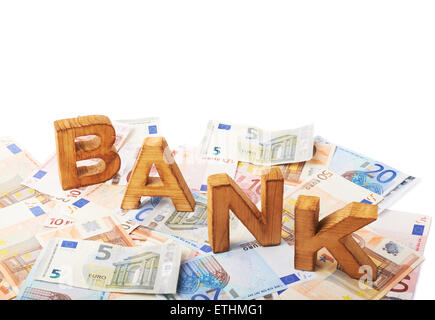 Word Bank over the pile of money Stock Photo