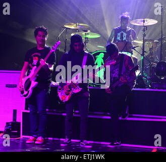 Pierce the Veil performing live in concert during their 'PTV & SWS World Tour'  Featuring: Jaime Preciado, Vic Fuentes, Mike Fuentes, of Pierce the Veil Where: Miami Beach, Florida, United States When: 25 Feb 2015 Credit: Johnny Louis/WENN.com Stock Photo