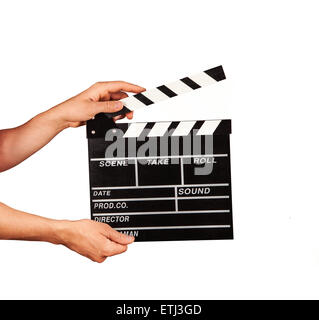 Man hands holding film clapper isolated on white background Stock Photo