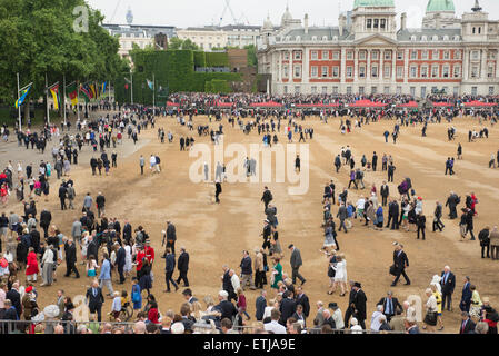 Crowds of spectators leave Horse Guards Parade after the 2015 Trooping the Colour ceremony in central London. Stock Photo