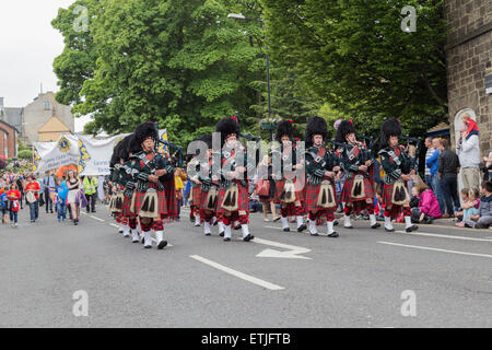 Knaresborough. North Yorkshire. UK. 13th June 2015. Pipers parading through Knaresborough before the start of the 50th annual bed race. Credit:  RHB/Alamy Live News Stock Photo