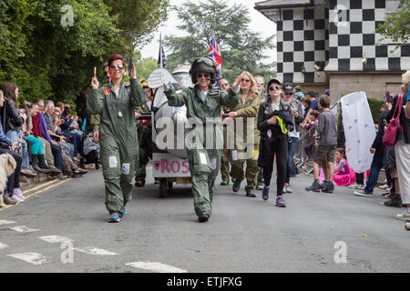 Knaresborough. North Yorkshire. UK. 13th June 2015. Team approching the start of the 50th annual bed race after parading through the town. Credit:  RHB/Alamy Live News Stock Photo