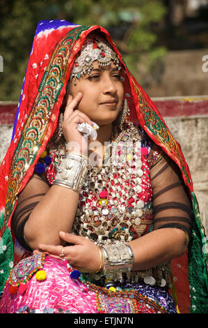 Image of Young Indian woman wearing exquisite traditional Rajasthani dress  and ornate