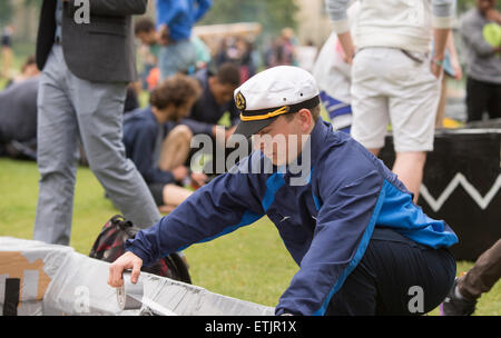 Cambridge, UK. 14th June, 2015. Cambridge University Students Cardboard Boat Race. Running repairs before the race by this captain. Credit:  Action Plus Sports/Alamy Live News Stock Photo