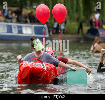 Cambridge, UK. 14th June, 2015. Cambridge University Students Cardboard Boat Race. Fancy dress was the order of the day for some teams. Credit:  Action Plus Sports/Alamy Live News Stock Photo