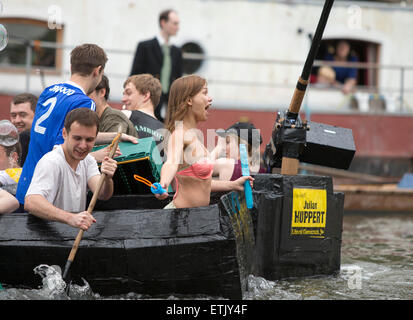 Cambridge, UK. 14th June, 2015. Cambridge University Students Cardboard Boat Race. Excitement on the faces as they near the finish line. Credit:  Action Plus Sports/Alamy Live News Stock Photo