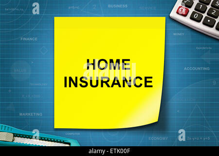 Home insurance text on yellow note with graph paper Stock Photo