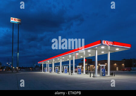 Deserted Exxon gasoline station by night in Rock Springs Wyoming. Stock Photo