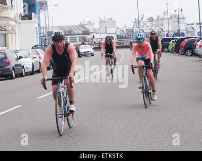 Portsmouth, UK. 14th June, 2015. Competitors undertake the cycling section of  the Portsmouth Try a Tri triathlon along Southsea Seafront. The event consisted of a number of sprint triathlons of different lengths to accommodate differing abilities. Credit:  simon evans/Alamy Live News Stock Photo