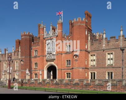 Hampton Court Palace west front entrance flying Union Jack Flag. A royal palace in the London Borough of Richmond upon Thames Greater London Surrey UK Stock Photo