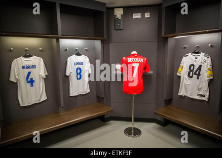 Wembley Stadium dressing room with football shirts on display Stock Photo