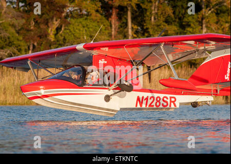 Searey, a small seaplane landing on the Chesapeake Bay, in Maryland, USA Stock Photo