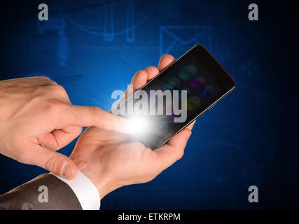 Businessmans hand holding mobile Stock Photo