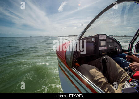 Instrument panel of seaplane while flying over water in Southeastern USA Stock Photo