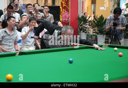 Wuhan, China. 14th June, 2015. Scottish professional snooker player John Higgins attends an activity in Wuhan, Hubei province, China on 14th May 2015. Credit:  Panda Eye/Alamy Live News Stock Photo