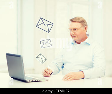 old man in eyeglasses filling a form at home Stock Photo - Alamy