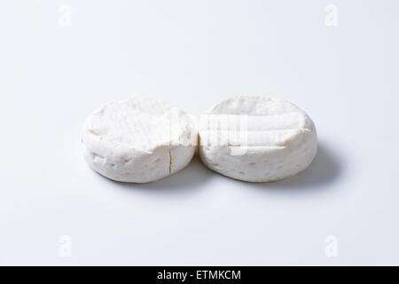 two wheels of soft creamy cheese with white mold Stock Photo