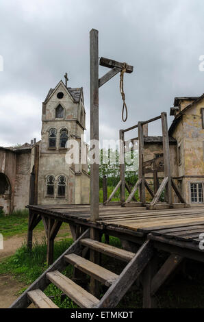Medieval scaffold gallows in the square of medieval town Stock Photo