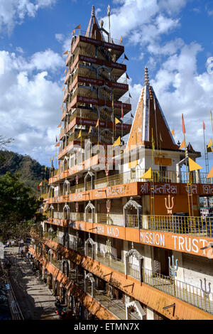 The Swarg Niwas Ashram, 13 storeyed temple on the bank of Ganges river near Laxman Jula, Rishikesh. Stock Photo