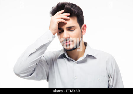 Casual man having headache isolated on a white background Stock Photo