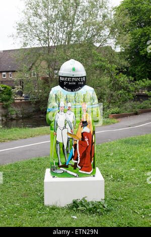 Painted depiction of the sealing of the Magna Carta by King John in 1215 at Runnymede on the back of a statue Stock Photo