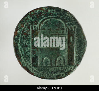 Roman coin. Dupondius. Reverse. Relief depicting the gate of the wall of Augusta Emerita. Brass. 1st century BC. National Museum of Roman Art. Merida. Spain. Stock Photo