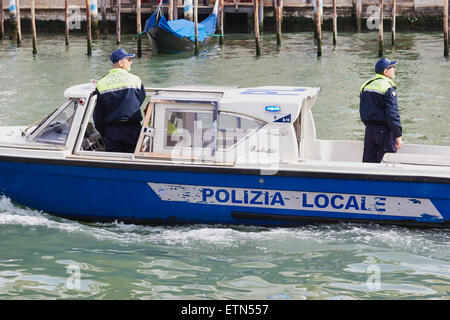 Polizia Locale patrol boat on the grand canal Venice Veneto Italy Europe Stock Photo
