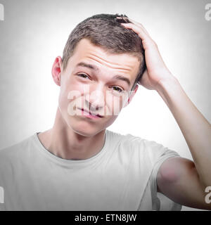 Young man with headache. Stock Photo