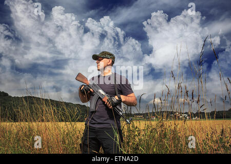 masked militant with a submachine gun by tactical operation Stock Photo