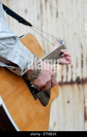 Close-up of  a man playing guitar Stock Photo