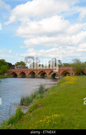 The 15th Century Great Barford Bridge over the River Ouse in Great Barford, Bedfordshire, England on a sunny day Stock Photo