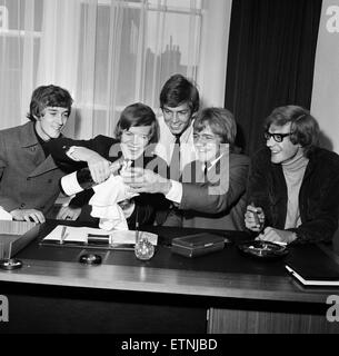 British pop group Herman Hermits, led by singer Peter Noone, pictured after the group were signed to a huge film and disc deal with Metro Goldwyn Meyer. The deal, in excess of one million dollars encompasses motion pictures and recordings. 15th March 1966. Stock Photo