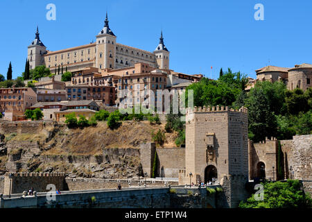 Looking up at the Alcazar with Alcantara bridge over the river Tagus, Toledo, Spain Stock Photo