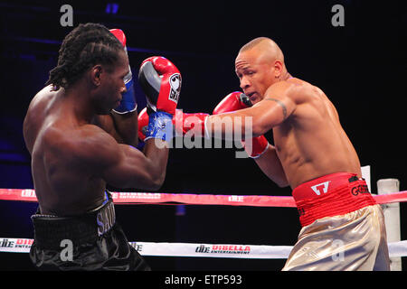 Mashantucket, CT, USA. 29th Sep, 2012. September 29, 2012: Issac ''Golden Boy'' Chilemba (gold trunks), fighting out of South Africa, turned in a workmanlike effort against veteran Rayco ''War'' Saunders (black trunks), pitching a shutout en route to a eight-round win by unanimous decision (80-72 X 3) on the undercard of HBO's Boxing After Dark at the MGM Theater at Foxwoods. © csm/Alamy Live News Stock Photo