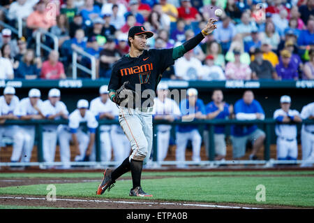 Omaha, NE, USA. 13th June, 2015. Miami first baseman Christopher Barr #17 fields a bunt and throws to 1st base in action during game 2 of the 2015 NCAA Men's College World Series between Miami Hurricanes and Florida Gators at TD Ameritrade Park in Omaha, NE.Florida 15-3.Today's attendance: 26,377.Michael Spomer/Cal Sport Media. © csm/Alamy Live News Stock Photo