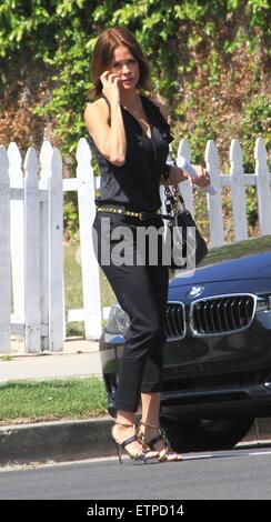 Brooke Burke-Charvet chats on her mobile phone as she leaves an audition in Los Angeles  Featuring: Brooke Burke-Charvet Where: Hollywood, California, United States When: 20 Mar 2015 Credit: WENN.com Stock Photo