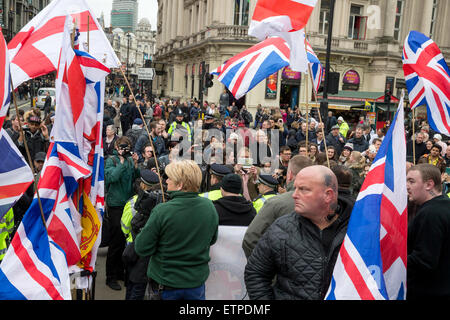 Large anti-racist march organised by UAF meets a counter demonstration by Britain First under the Eros statue in Piccadilly Circus  Featuring: Atmosphere Where: London, United Kingdom When: 21 Mar 2015 Credit: Mario Mitsis/WENN.com Stock Photo