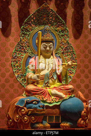 The Lord Buddha in Chinese Buddha Tooth Relic Temple in Chinatown of Singapore Stock Photo