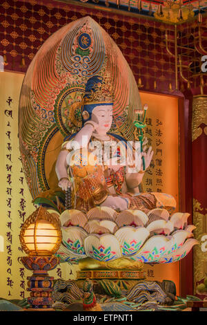 The Lord Buddha in Chinese Buddha Tooth Relic Temple in Chinatown of Singapore Stock Photo