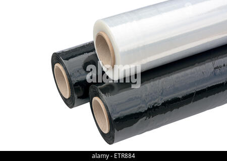 Three rolls of stretch film packaging black and transparent. Wrapping film. Isolated on white background. Stock Photo