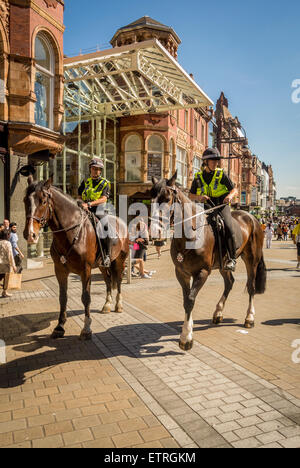 Two mounted police officers in Leeds city centre, UK. Stock Photo