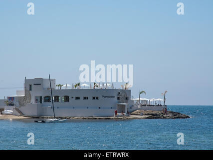 Puro beach popular exclusive beach club with people on a hot summer day on July 24, 2014 in Can Pastilla, Mallorca, Spain. Stock Photo