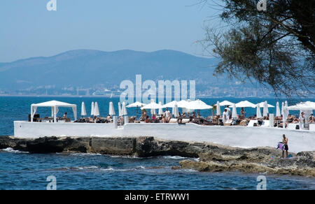 Puro beach popular exclusive beach club with people on a hot summer day on July 24, 2014 in Can Pastilla, Mallorca, Spain. Stock Photo