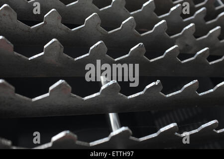 Abstract background with metal teeth pattern Stock Photo