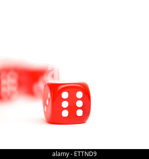 rolling red dice isolated on white Stock Photo