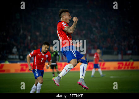 Santiago, Chile. 15th June, 2015. Eduardo Vargas of Chile celebrates scoring against Mexico during the the Group A match of the Copa America 2015, at the National Stadium, in Santiago, Chile, on June 15, 2015. The match ended with a 3-3 draw. Credit:  Pedro Mera/Xinhua/Alamy Live News Stock Photo